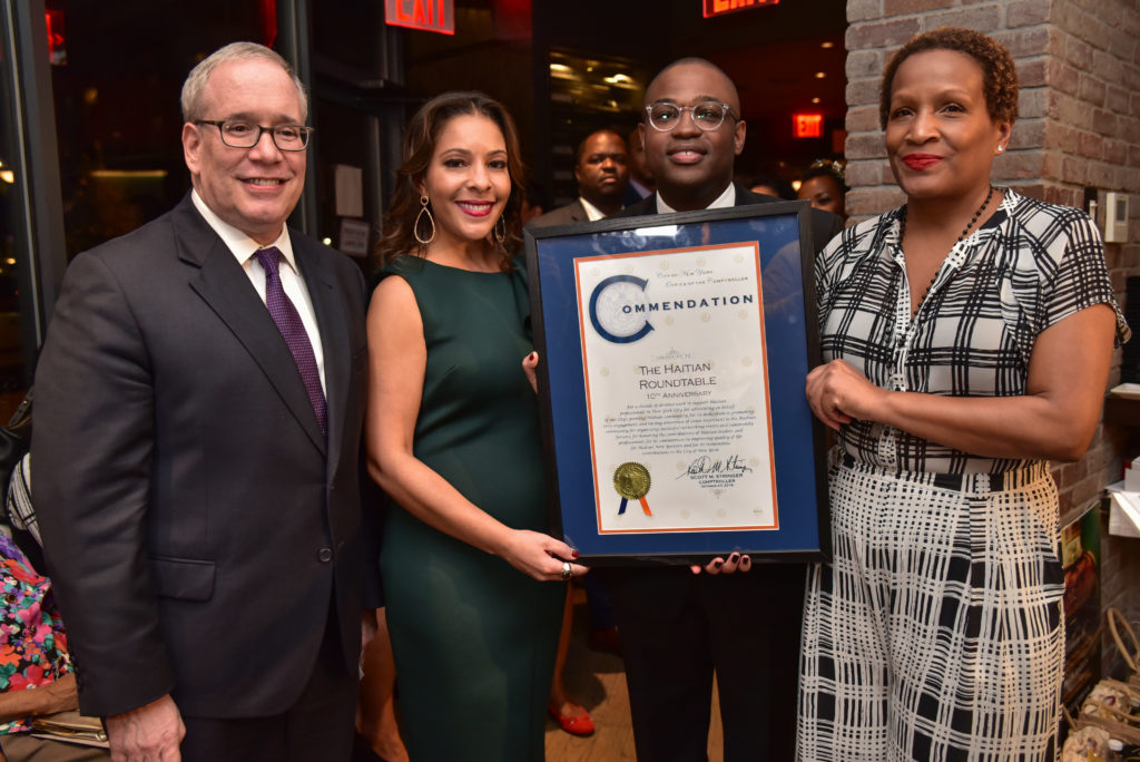New York City Comptroller Scott Stringer honors the Haitian Roundtable with special commendation
l-r Stringer, Co-Founder & Vice Chair Daphne Leroy, Co-Founder & Vice Chair Patrick Lespinasse, and Co-Founder & Chair Rosemonde Pierre-Louis. Photo credit: David Paul