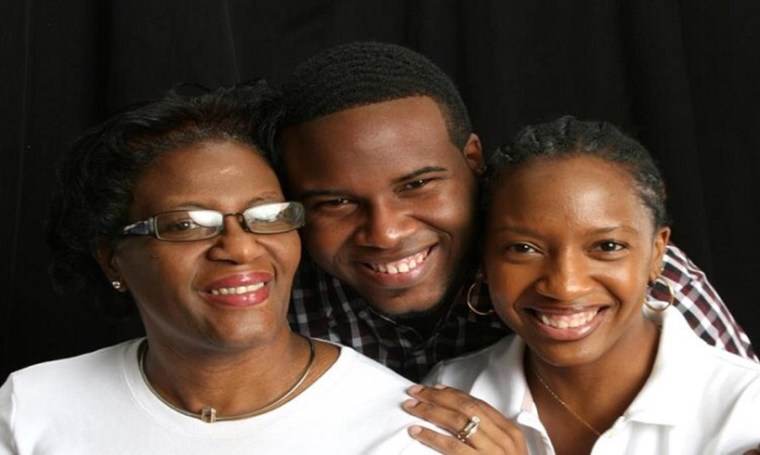 St. Lucia's Botham Jean flanked by his sister and mother was murdered by Amber Guyger.