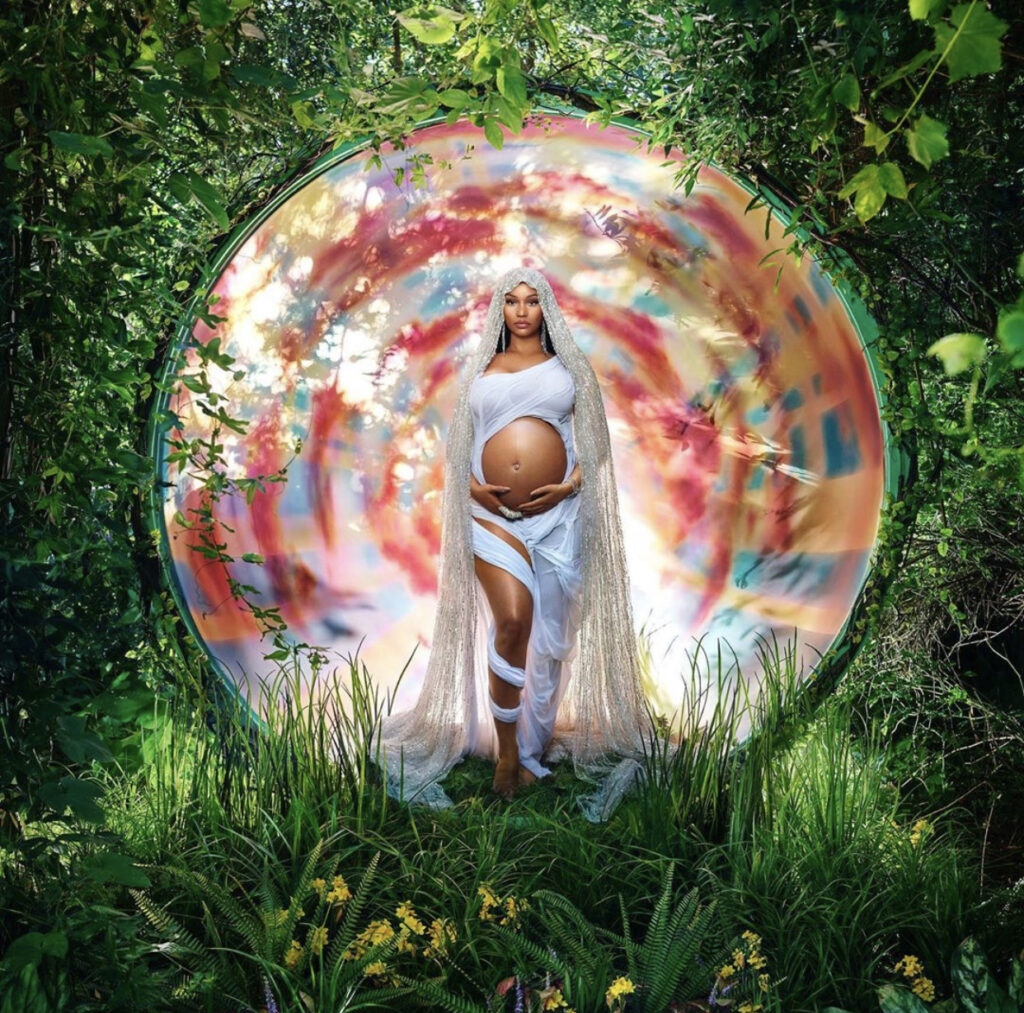 Nicki Minaj reveals pregnancy with photos shot by David LaChappelle. A baby girl might be baking in her tummy. 