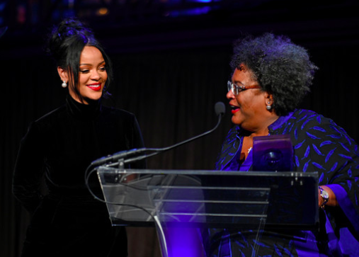 Rihanna and Prime Minister of Barbados Mia Mottley - 4000 tablets