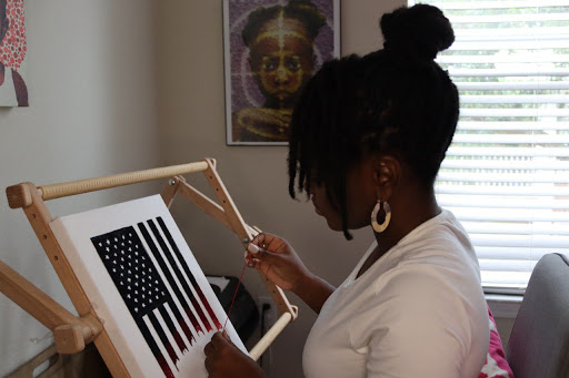 Trini Artist Nneka Jones lands her first TIME Magazine cover with artwork of her tapestry inspiration of the American flag. 